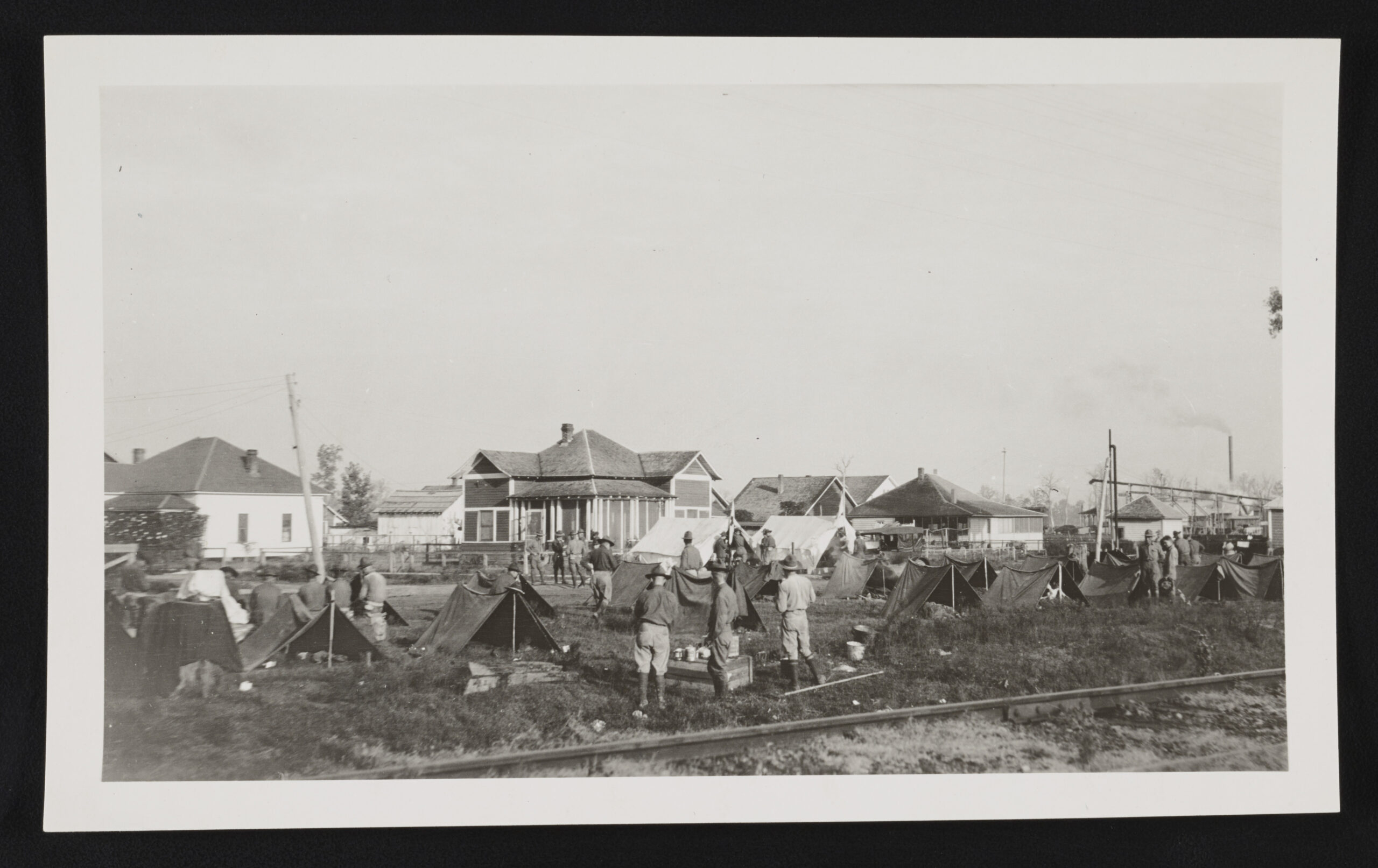 Black-and-white 1919 photograph of U.S. Army soldiers of the 57th Infantry in pup tents during the Elaine race riot in Arkansas.