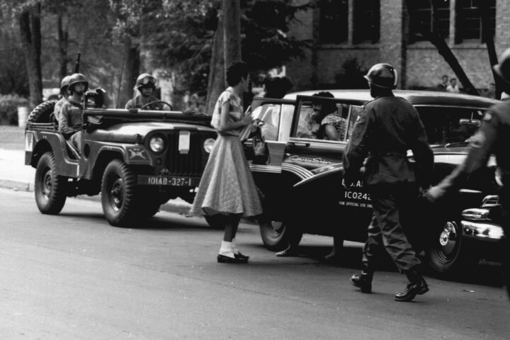 U.S. Army paratroopers of the 101st Airborne Division escorting members of the Little Rock Nine to Central High School in Little Rock, Arkansas, September 1957.